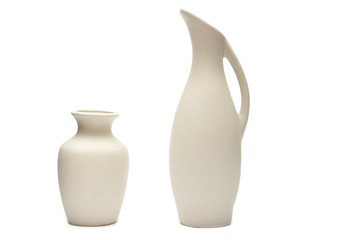 Pottery, vase, white clay jug isolated on white background. A mockup of pottery made from white clay on a white background.