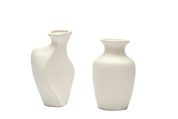 Pottery, vase, white clay jug isolated on white background. A mockup of pottery made from white clay on a white background.