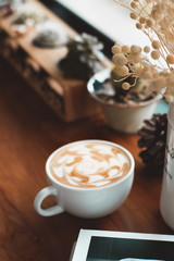 single coffee cup on table.Coffee is trendy beverage in the morning.