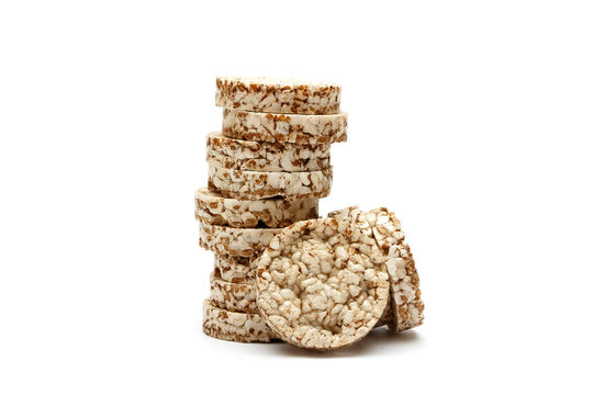 Crispy crispbread with buckwheat, rice and oatmeal isolated on white background. Crisp dietary fitness bread. Food for weight loss.
