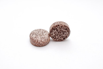 iron supplement pills on a white background