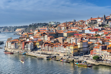 Fototapeta na wymiar Looking across the Douro river to Riberia in Porto Portugal
