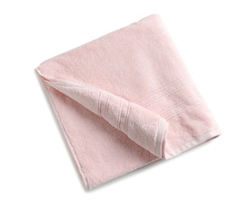 Folded soft terry towel on white background, top view