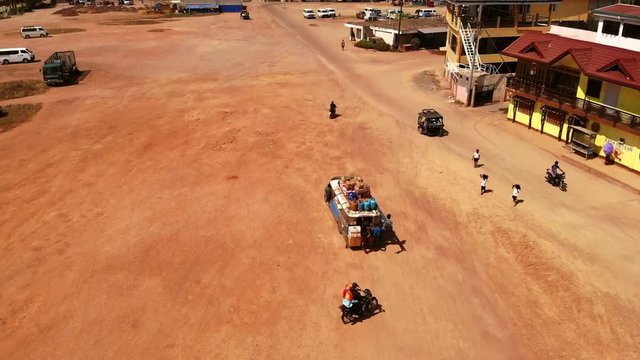 Aerial View Jeepney Bus Picking Up Locals.
