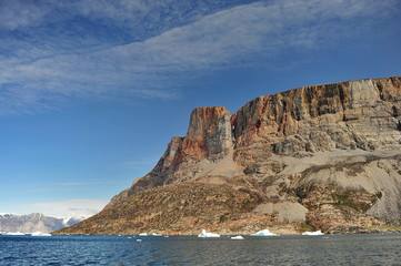 Fototapeta na wymiar Iceberg, mountains, water, sky.
