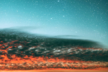 a nature background. coral clouds over turquoise sky