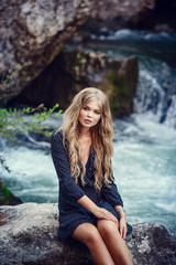 Happy pretty girl in field at sunset. Art photo