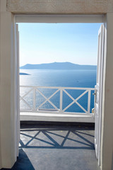 View of The Mediterranean Sea through the open door, Santorini, Greece