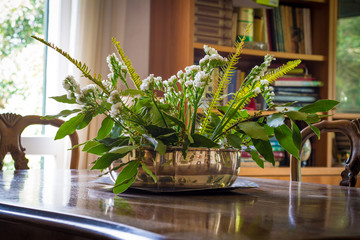 centerpiece with flowers and leaves