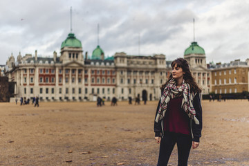 Obraz premium portrait of young woman in front of the palace