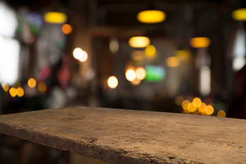 Beer barrel with beer glasses on a wooden table. The dark brown background.