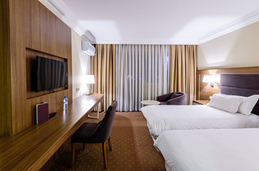 Modern interior of a classic room in the hotel - obrazy, fototapety, plakaty