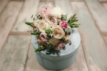 Beautiful bridal bouquet of powder roses.