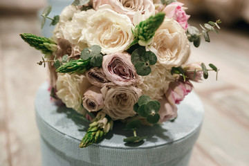 Beautiful bridal bouquet of powder roses.