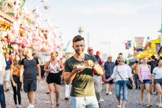 Man In An Amusement Park