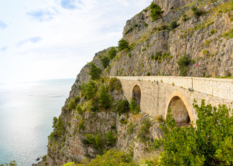 Fototapeta premium Mountain road with sea view near Maratea, Basilicata, Italy