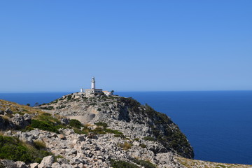 Fototapeta na wymiar lighthouse faro cliff horizont