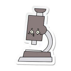 sticker of a cute cartoon microscope