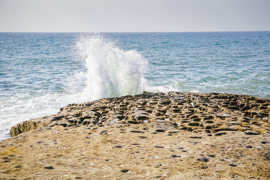 Waves Crashing at Sunset Cliffs Natural Park near La Jolla, San Diego California