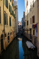 Fototapeta na wymiar Italy, Venice, Venice, CANAL PASSING THROUGH CITY BUILDINGS