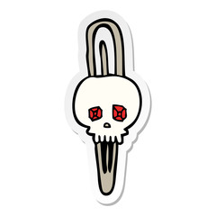 sticker of a cartoon skull hairclip