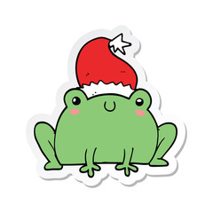 sticker of a cute cartoon christmas frog