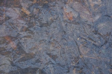gray plastic texture of wet cellophane