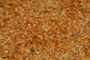 brown wooden texture of small sawdust in a heap