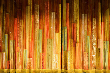 Abstract background of color strips in the form of a concert curtain. Background for design and project.