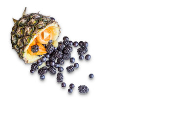 Fruit summer cocktail in pineapple. Flat lay, top view, copy space. Minimum summer concept.