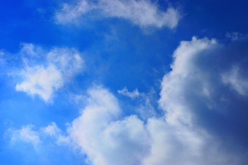 white clouds on blue sky on a sunny day