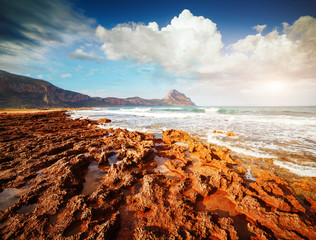 The unique shape of the volcanic beach in sunlight. Location place cape San Vito, Sicily, Italy.