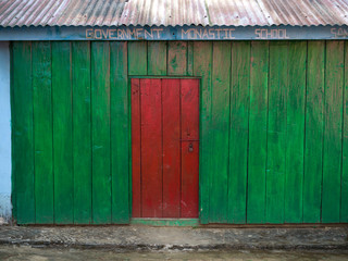 Close-up of red door of school building, Shanku Monastery, Radhu Khandu Village, Sikkim, India