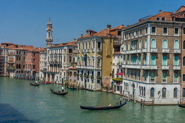 Italy, Venice, Grand Canal, BOATS IN CANAL BY BUILDINGS IN CITY