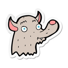sticker of a cartoon happy wolf