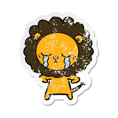 distressed sticker of a crying cartoon lion