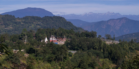 Fototapeta na wymiar View of temple with mountain range in the background, Sikkim, India