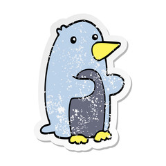 distressed sticker of a cartoon penguin