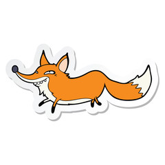 Obraz premium sticker of a cartoon sly fox