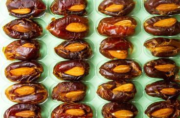 Fresh dates with almonds flat lay