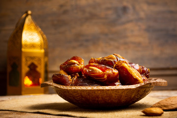 Fresh dates with almonds on a table