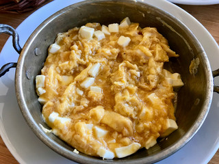 Turkish Breakfast Fried Egg Omelette / Scrambled Eggs with Cheese in Pan.