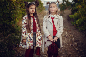 girls in September to harvest vineyards , collect the selected grape bunches