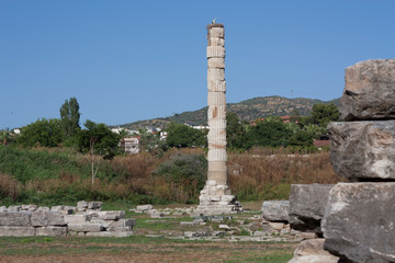 Fototapeta na wymiar Temple of Artemis one of the seven wonder of the ancient world - Selcuk, Turkey . Storks nest in an old colony in the middle of a wasteland in the ancient city of Ephesus photo