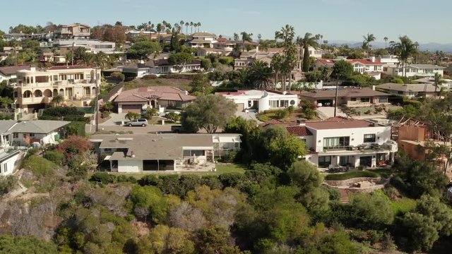 Slow aerial pan of luxury homes in La Jolla California 4k