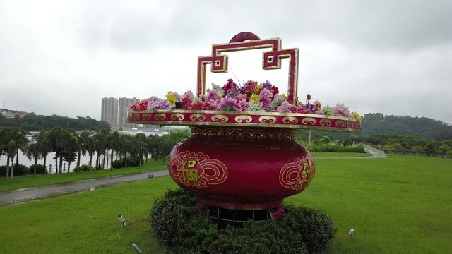 This is a pan around of a large flower pot in the city of Yangjiang China. Shot on a DJI Mavic Pro.