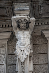 Statue of powerful and emotional atlas of Renaissance Era in Vienna, Austria, details, closeup