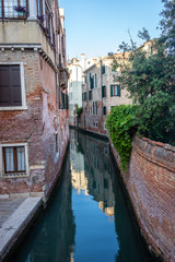 Fototapeta na wymiar Europe, Italy, Venice, Italy, VIEW OF CANAL AMIDST BUILDINGS IN CITY