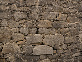 Old, rough stone wall texture