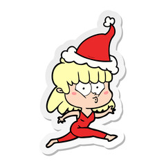 sticker cartoon of a woman running wearing santa hat